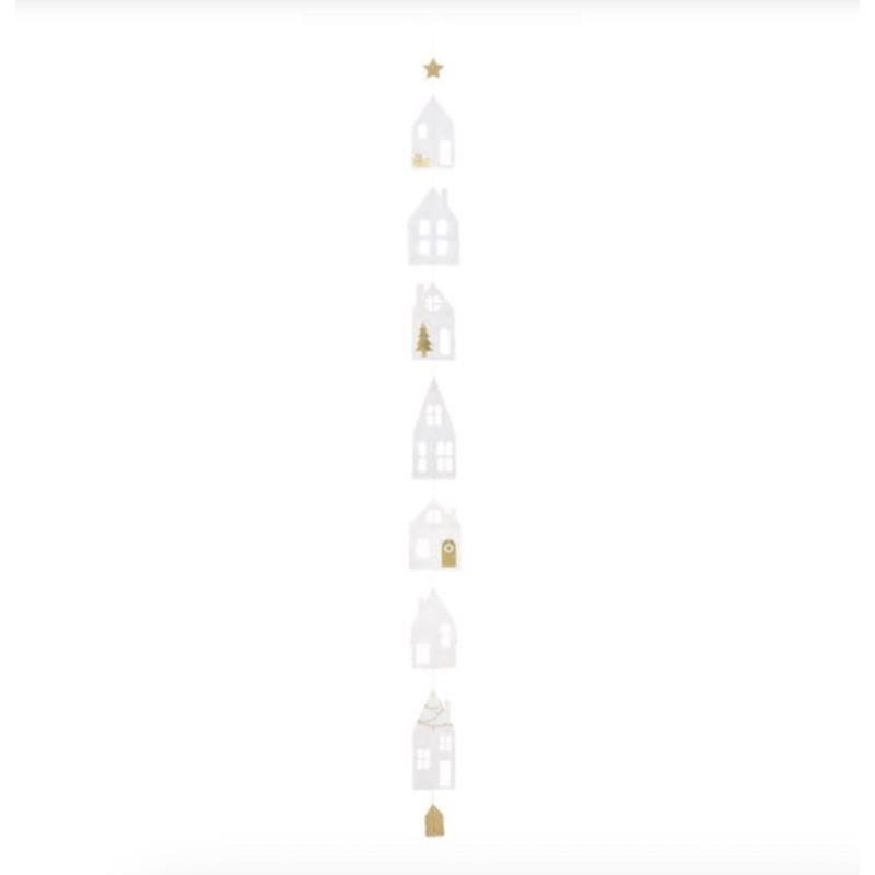 Une très jolie décoration faite de petites maison en papier blanc avec des détails dorés.