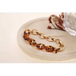 Bracelet semi-épais doré moitié chaîne classique moitié chaîne résine léopard