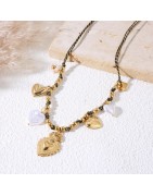 Bracelet chaîne dorée à charms cœurs bombés et ex-voto ciselés