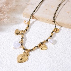 Bracelet chaîne dorée à charms cœurs bombés et ex-voto ciselés