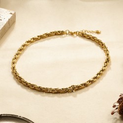 Collier doré maille gourmette torsadée double brin chaîne épaisse et entrelacée effet miroir