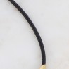 Collier sur Cordon Noir avec Pièce Courbe en Acier Doré  IKITA